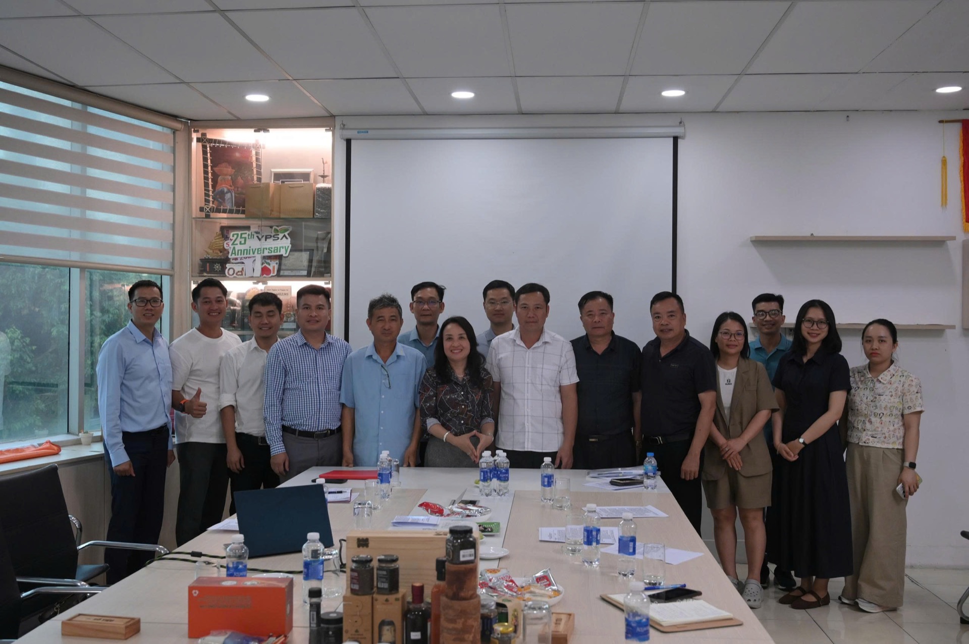Delegates of both sides taking a group photo at the VPSA office