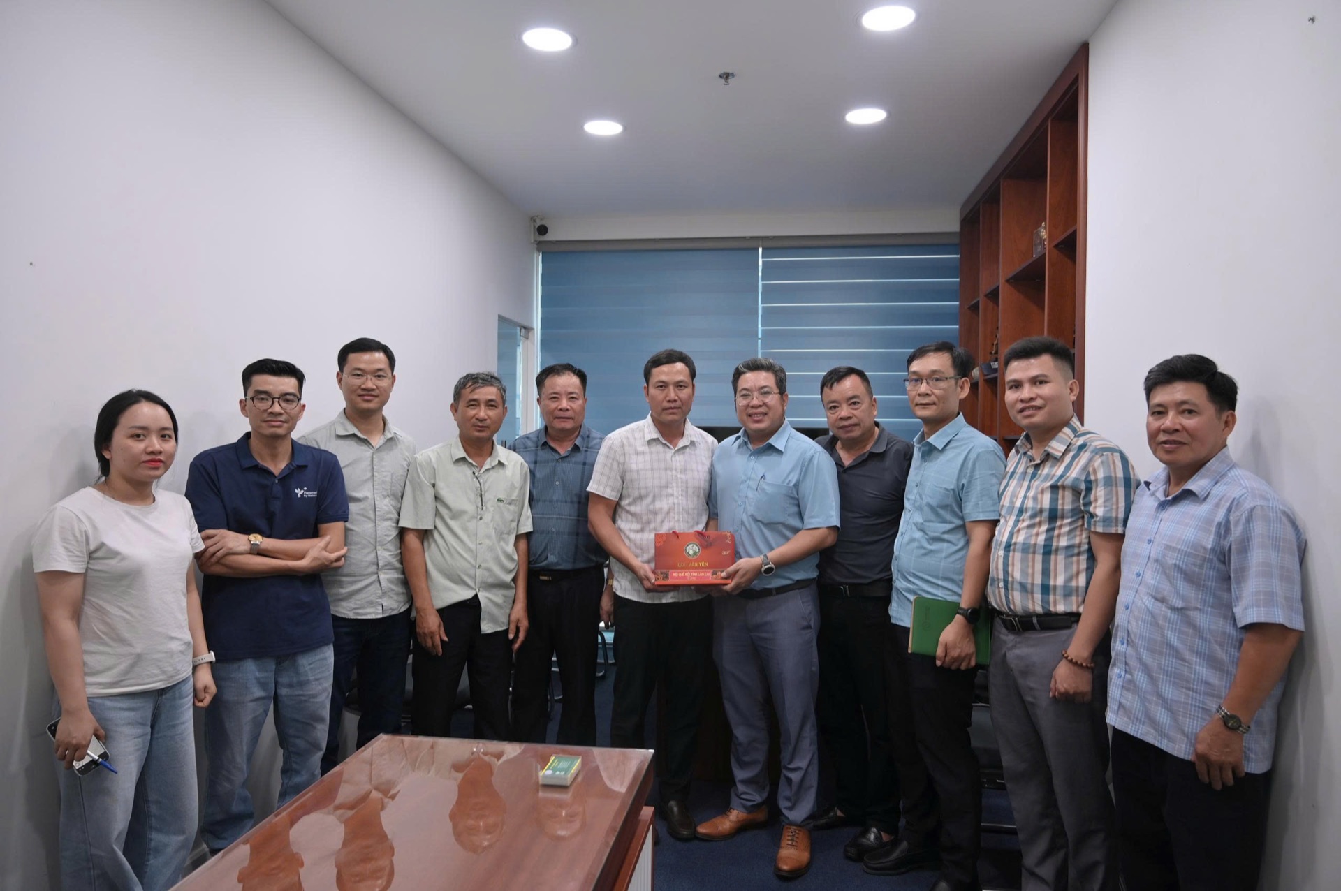 The Association’s delegation visiting and working with a partner in Ho Chi Minh City